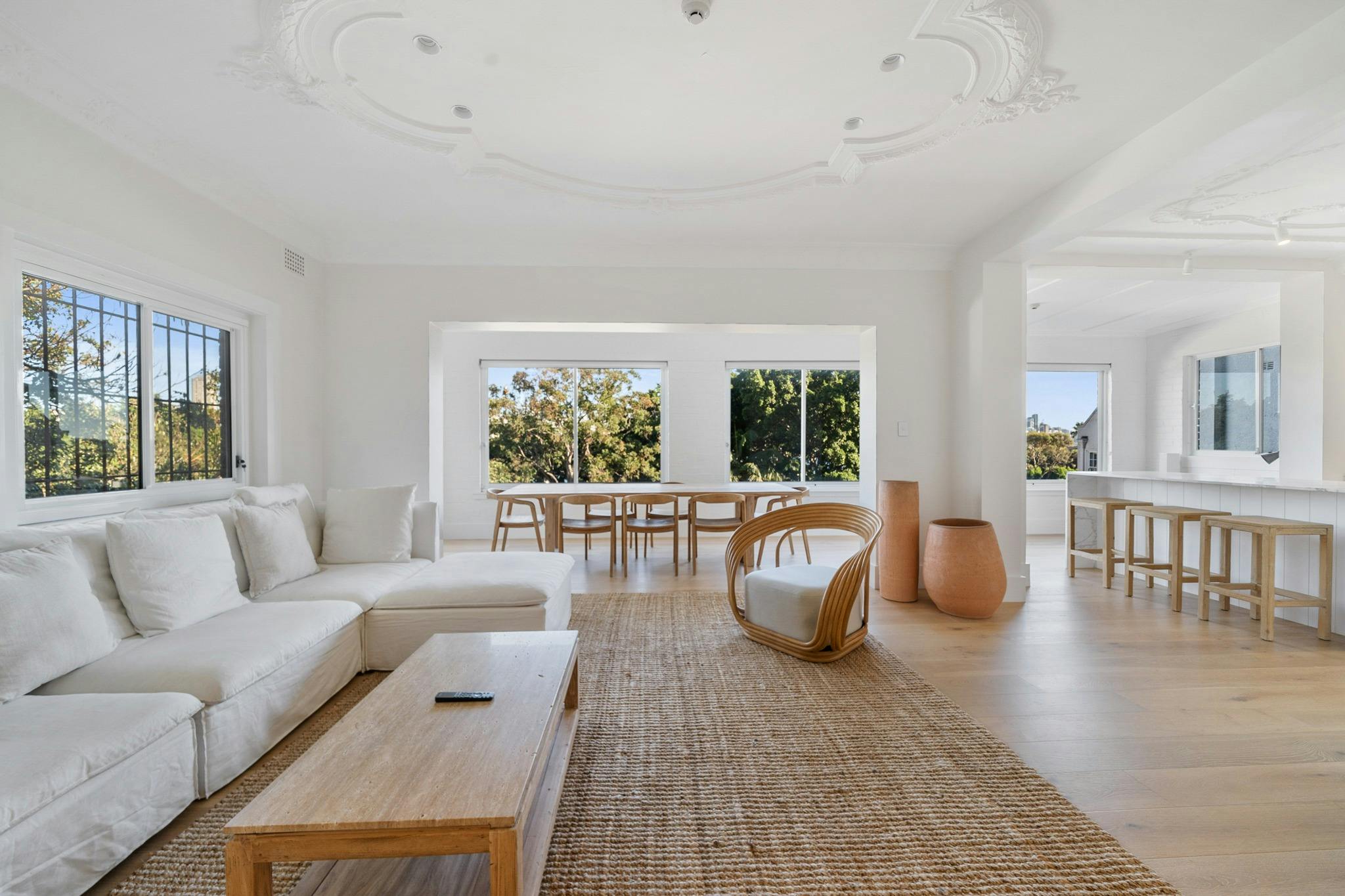 Bright and airy living area with elegant furniture.