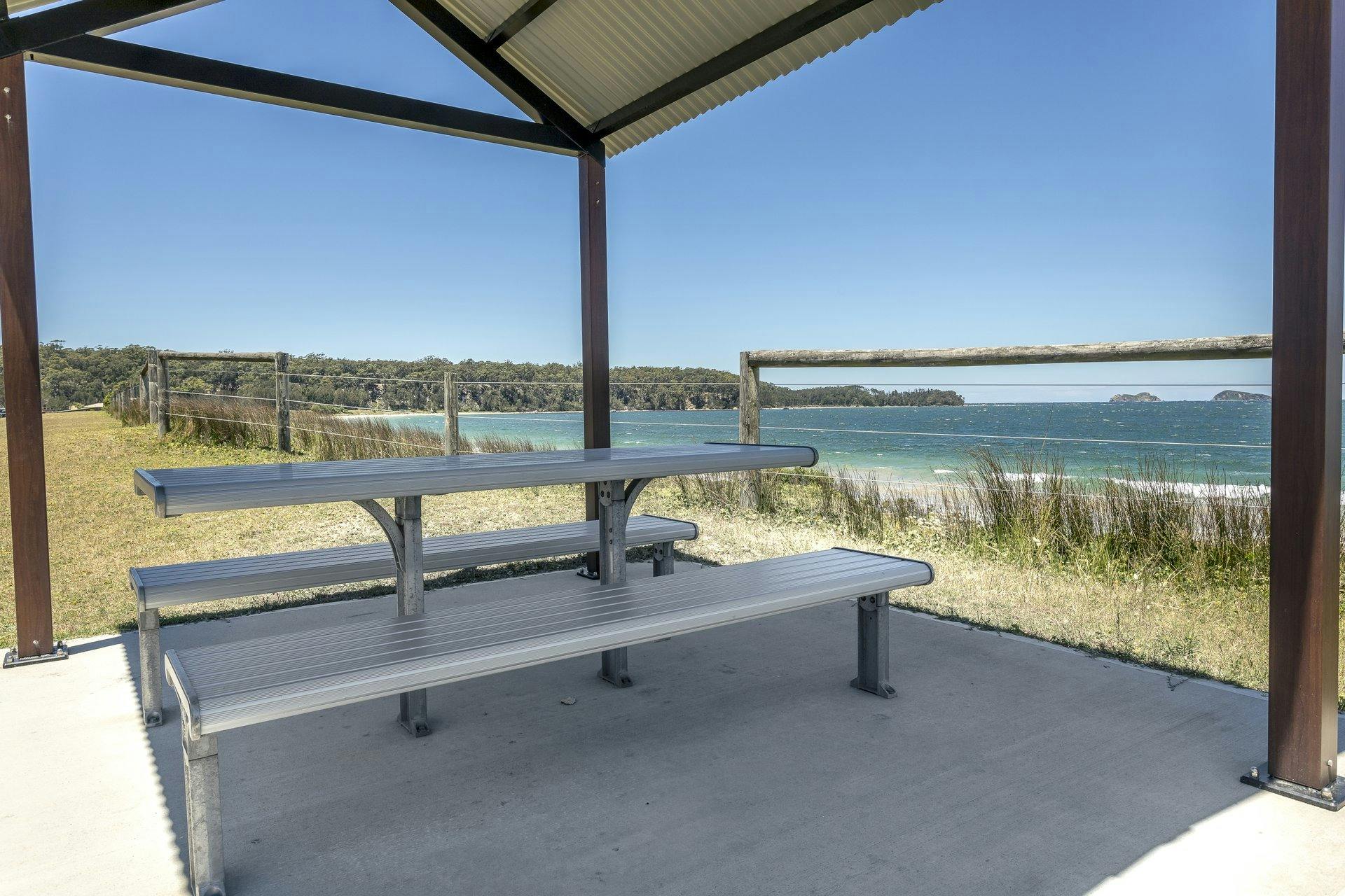 Picnic tables at Maloneys Beach