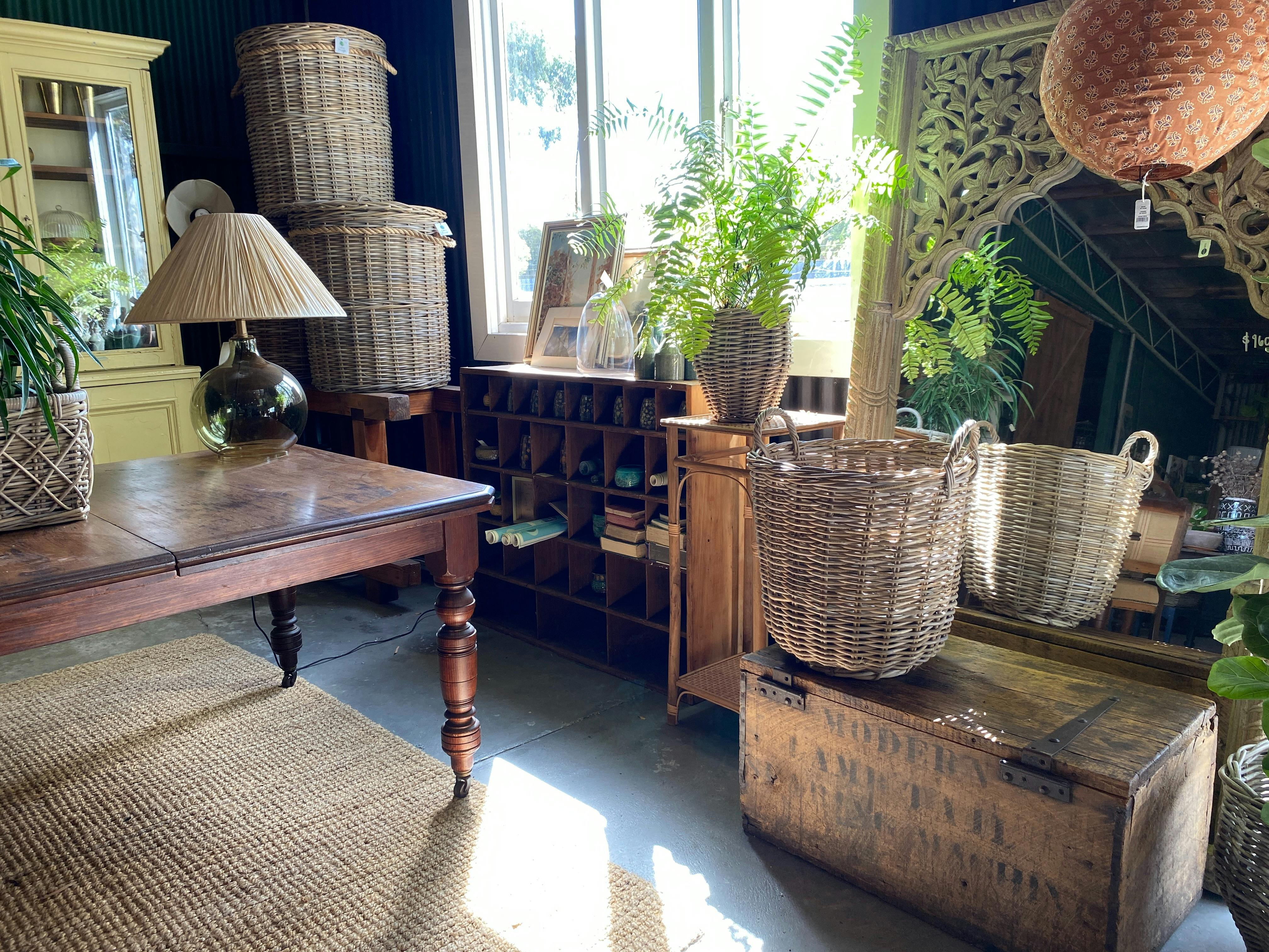 An eclectic mix of homewares sit nestled amongst one-off pieces of restored rustic vintage furniture