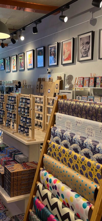 Art prints and wrapping add playful charm to Pom Pom Store’s interior.
