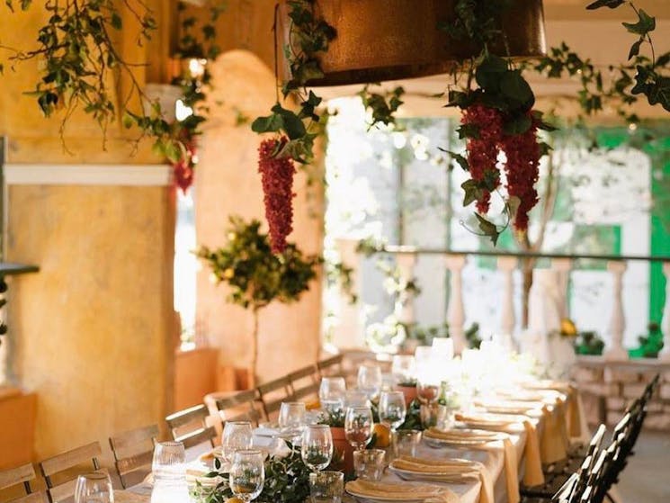 Dining table and tuscan inspired decorations