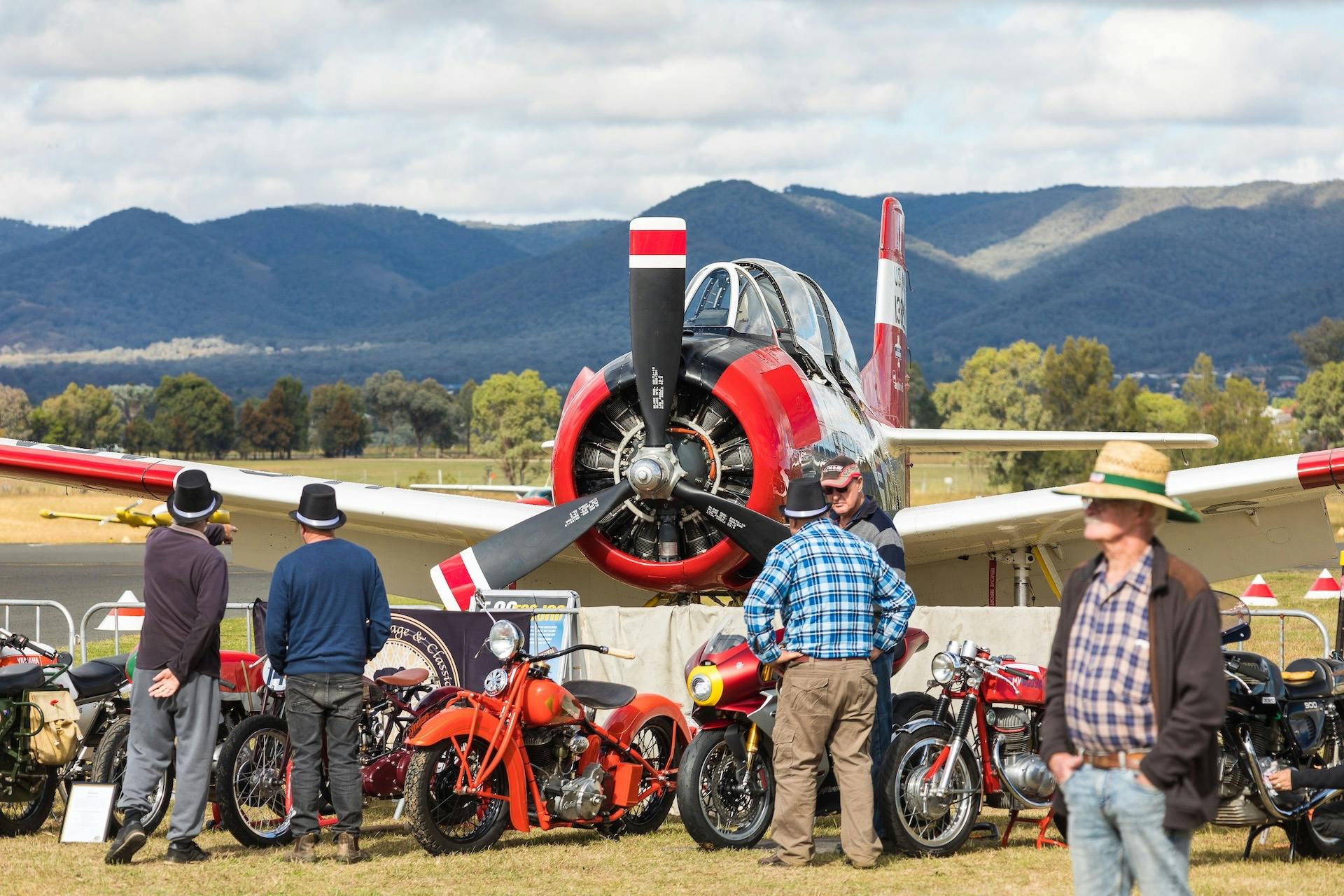 Warbirds and motorcycles on display