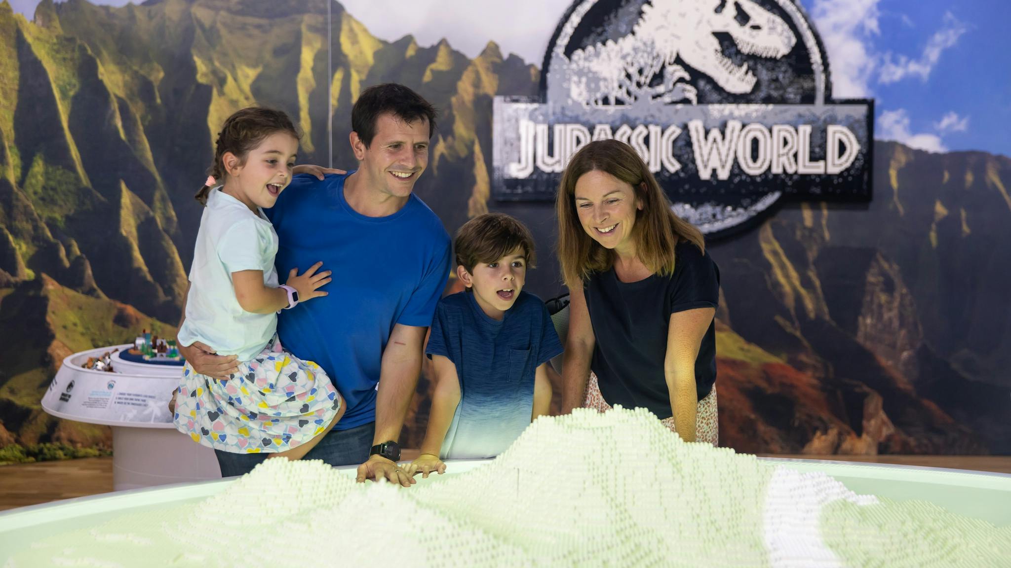 A family with young children at Jurassic World by Brickman exhibition