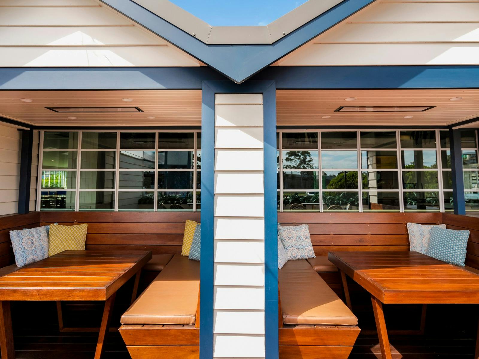 outdoor cabana seats at The Camellia Hotel with cushions