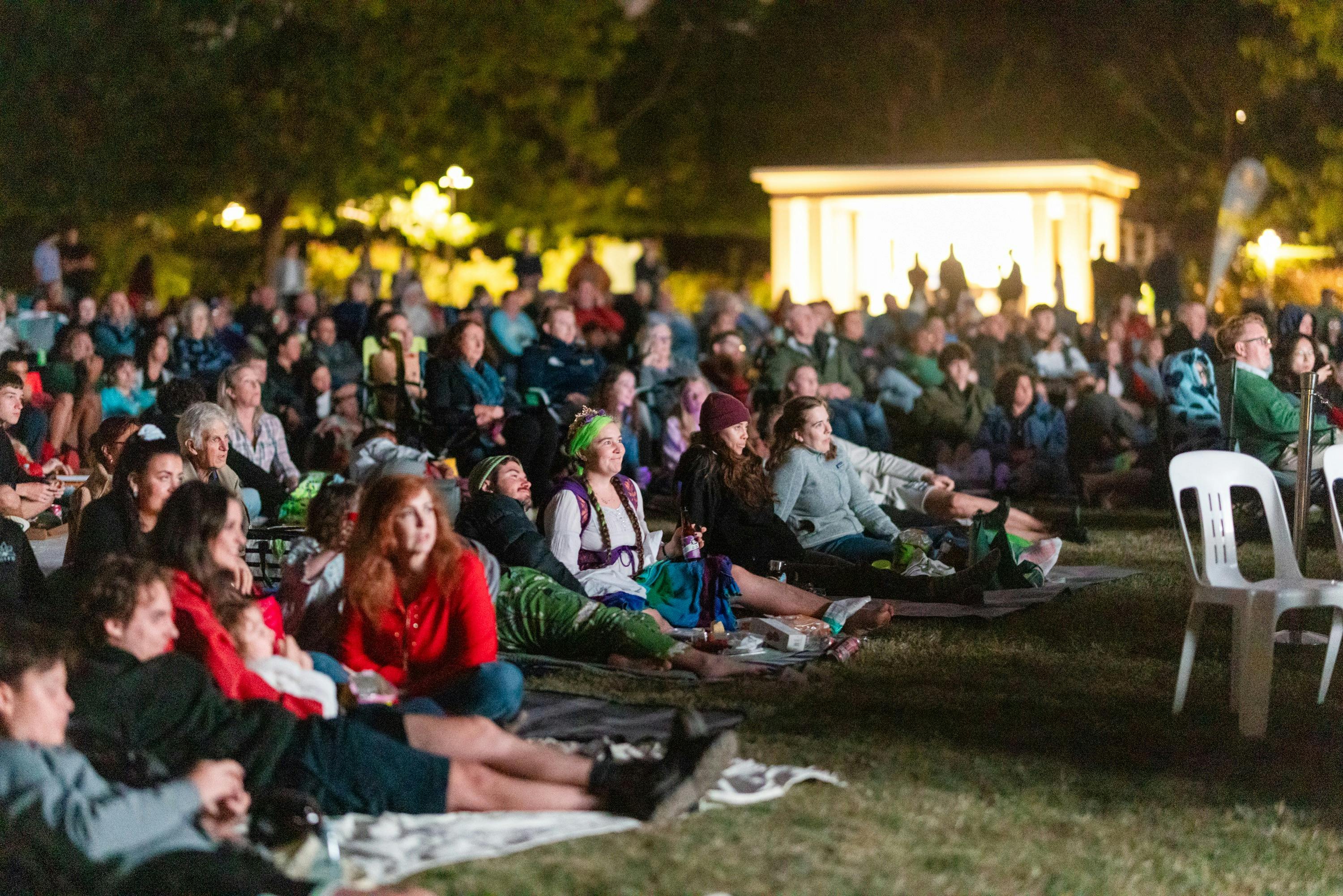Crowd sitting in front of screen for Lights! Canberra! Action!