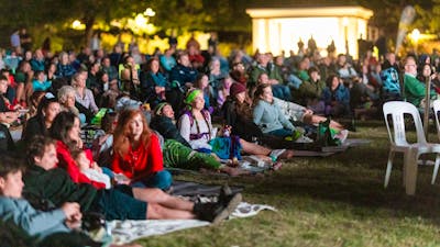 Crowd sitting in front of screen for Lights! Canberra! Action!