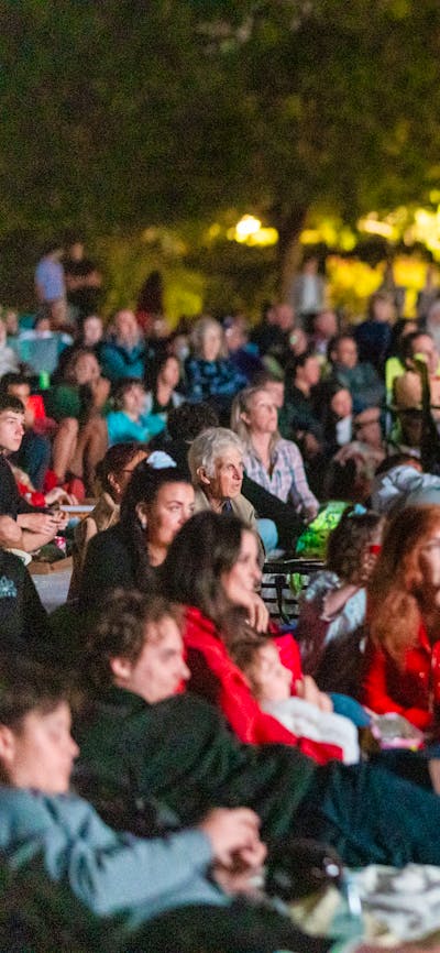 Crowd sitting in front of screen for Lights! Canberra! Action!