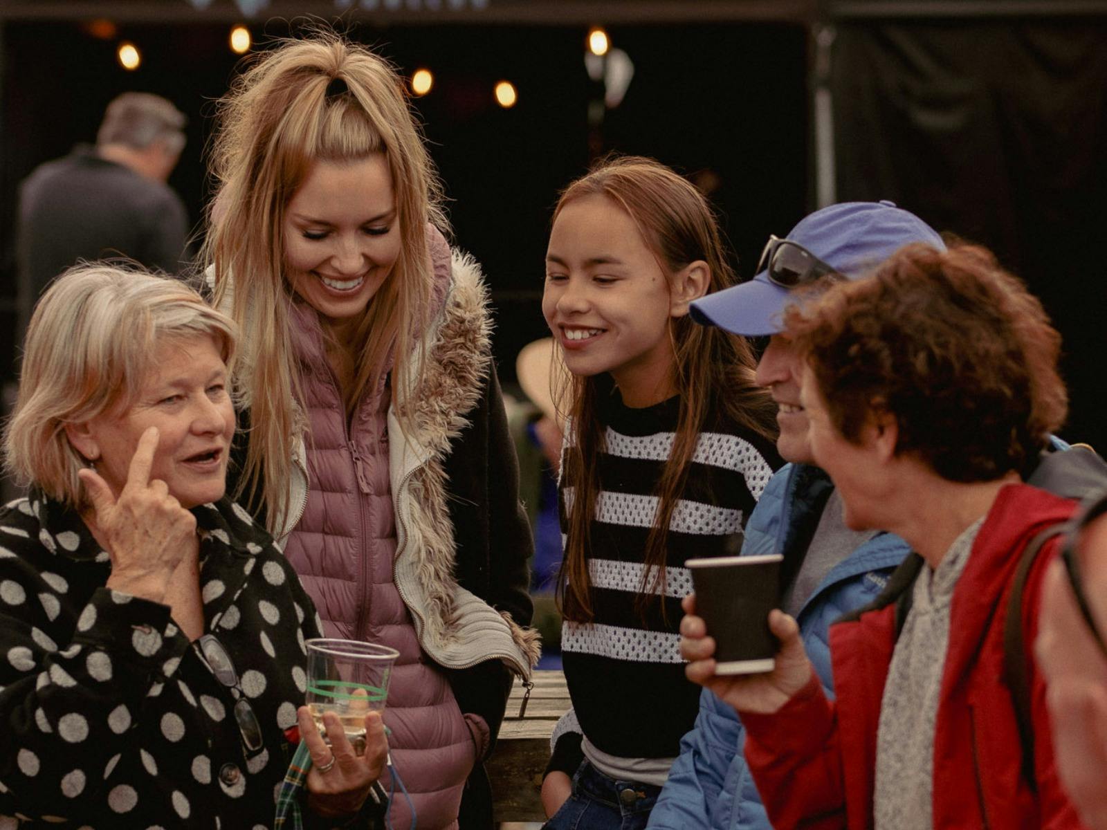A multigenerational group chatting at Easy Tiger in St Helens, Tasmania.
