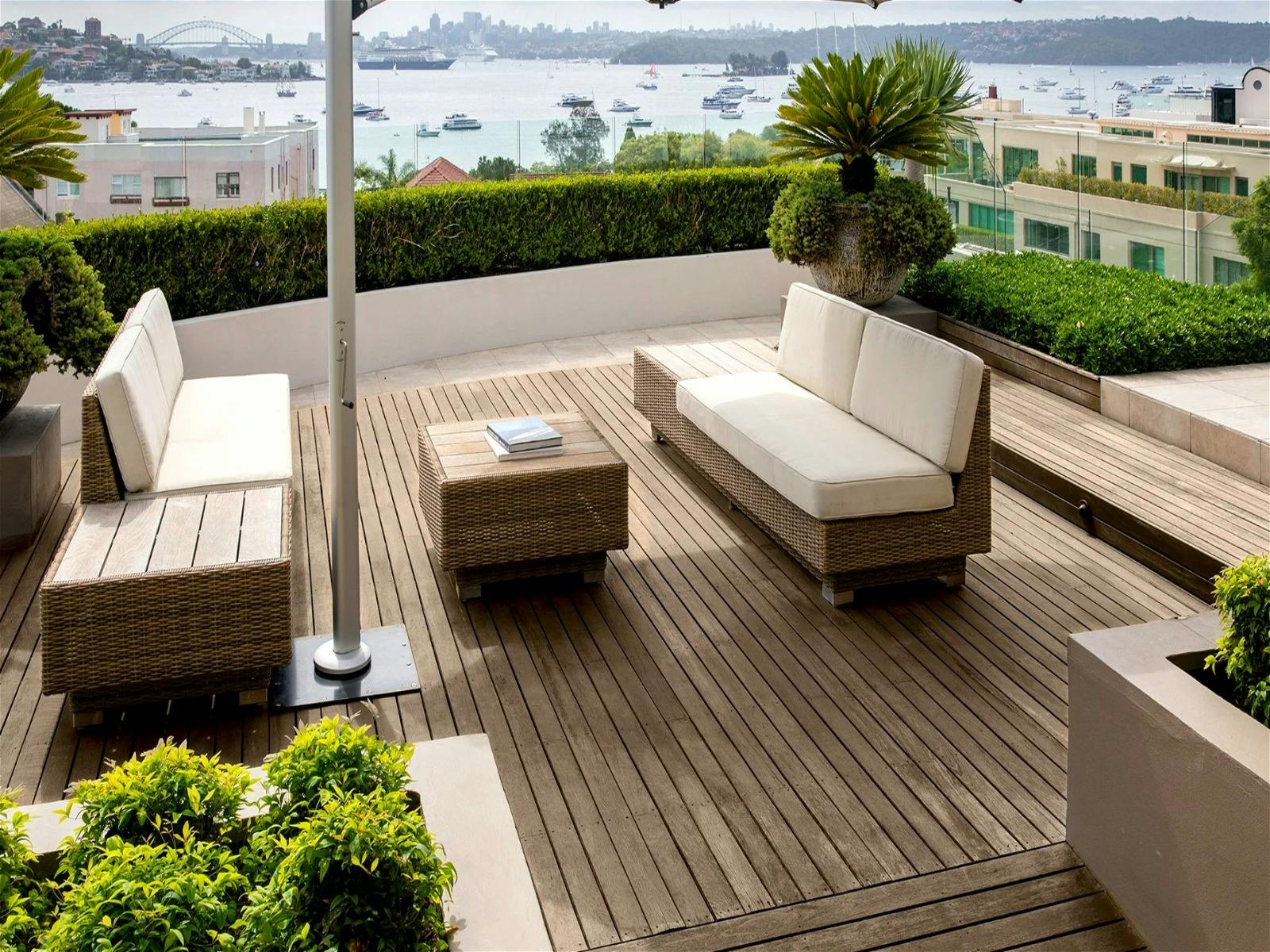 incredible terrace overlooks the surrounding lush gardens