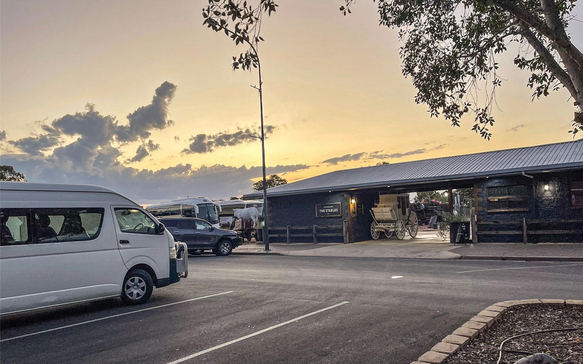 A van parked outside the stables courtyard
