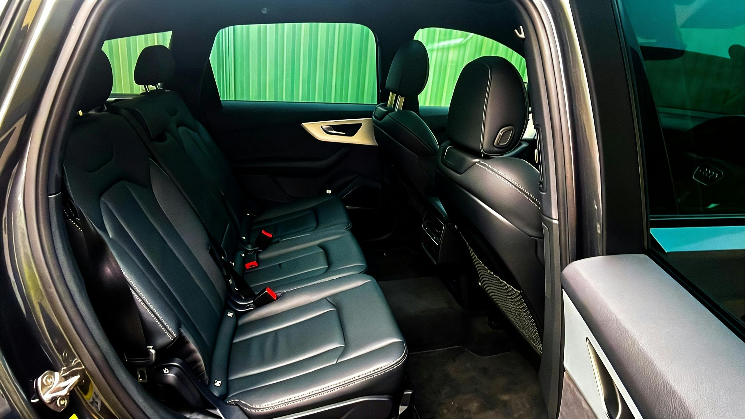Premium black leather rear cabin of Audi Q7 — The First Chauffeurs luxury chauffeur Sydney