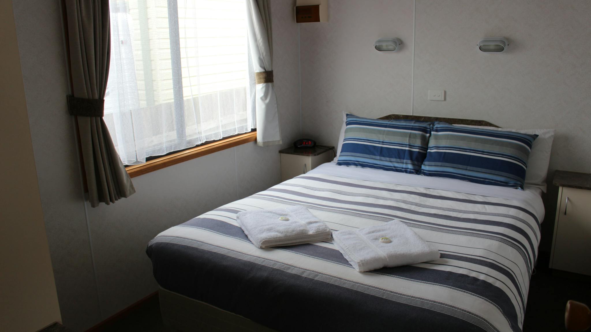 Main bedroom in Deluxe Villa Cabins