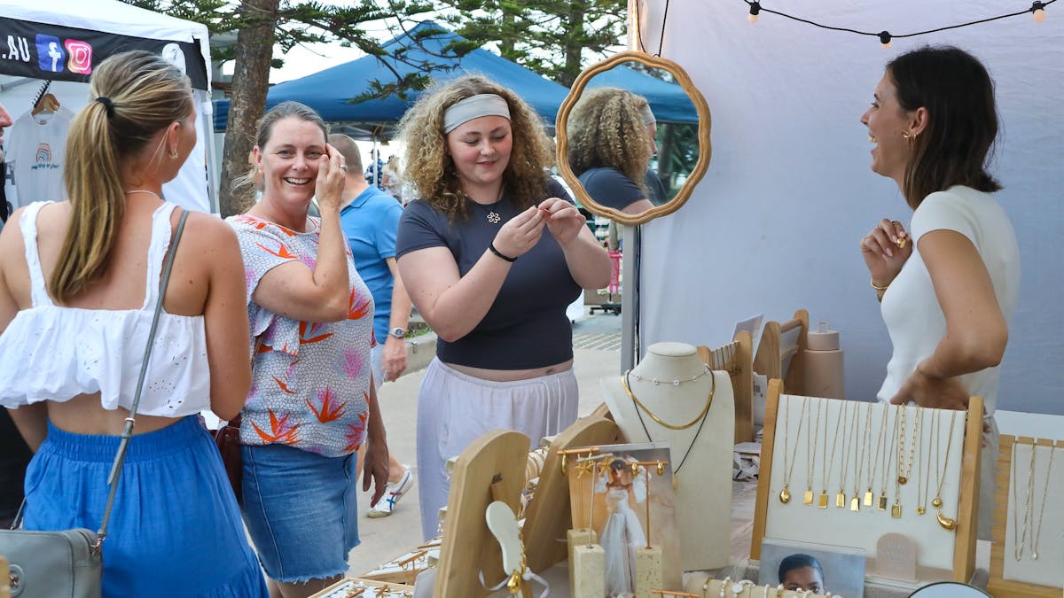 Trying on jewellery at Surfer's Paradise Markets