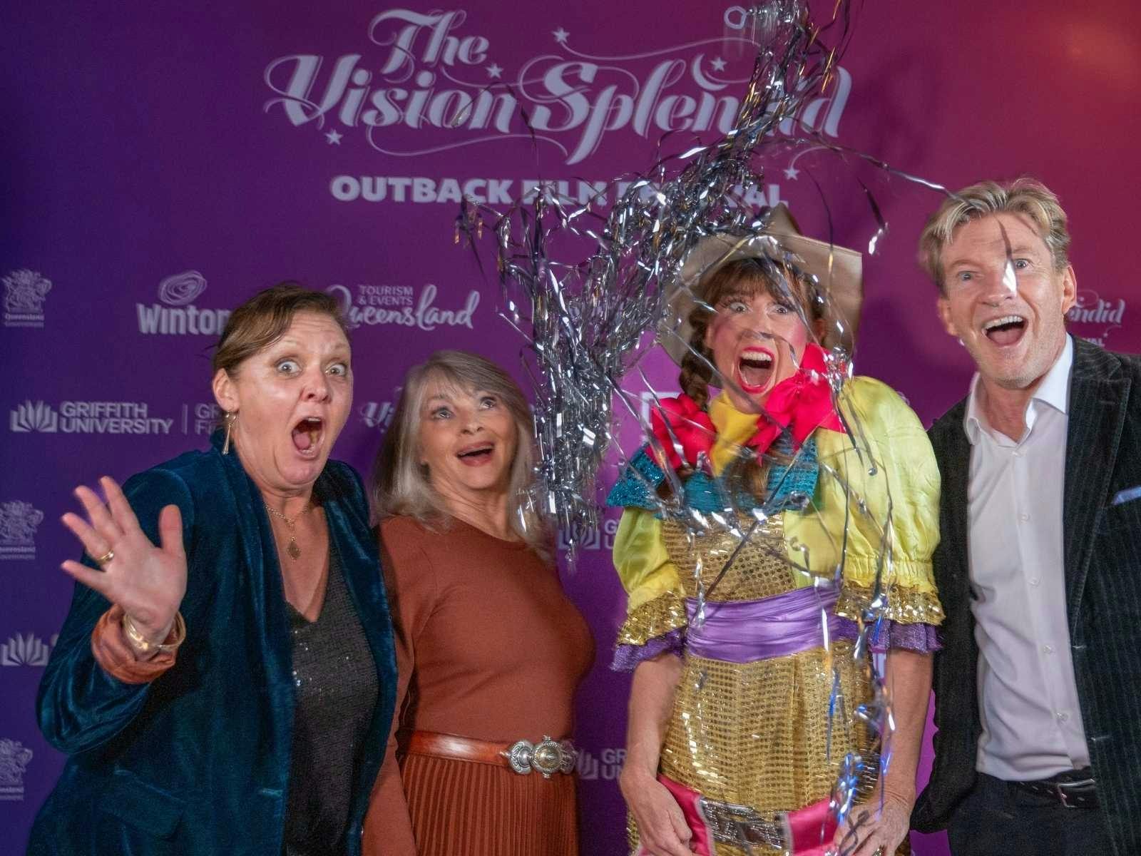 Victoria Baldock, Delvene Delaney, S.T.Ruth & David Wenham stand infront of Vision Splendid wall.