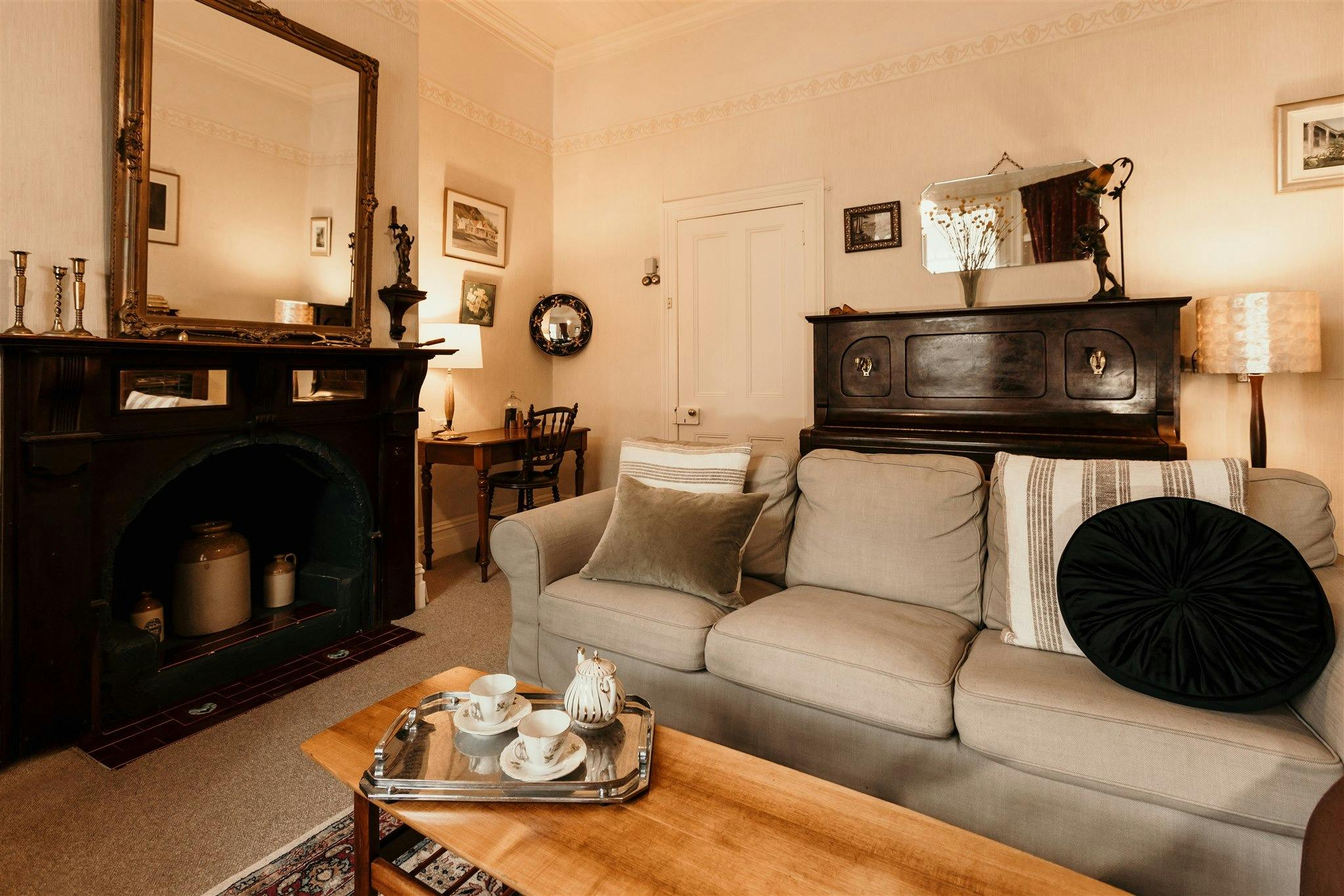 seating for 6+, tv, electric heating, piano, views to the garden, a well loved family home