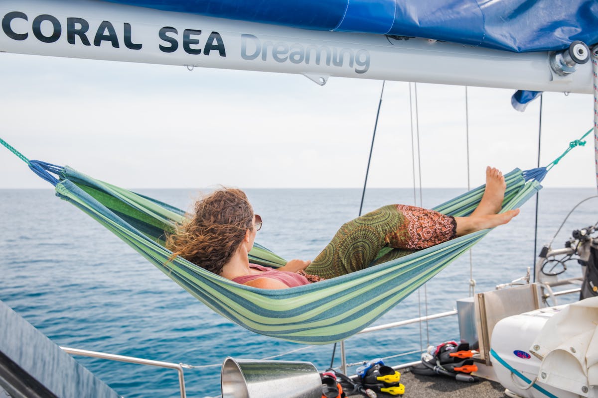 Relax on the deck - Cairns only overnight sailing experience