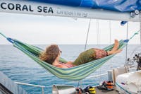 Relax on the deck - Cairns only overnight sailing experience