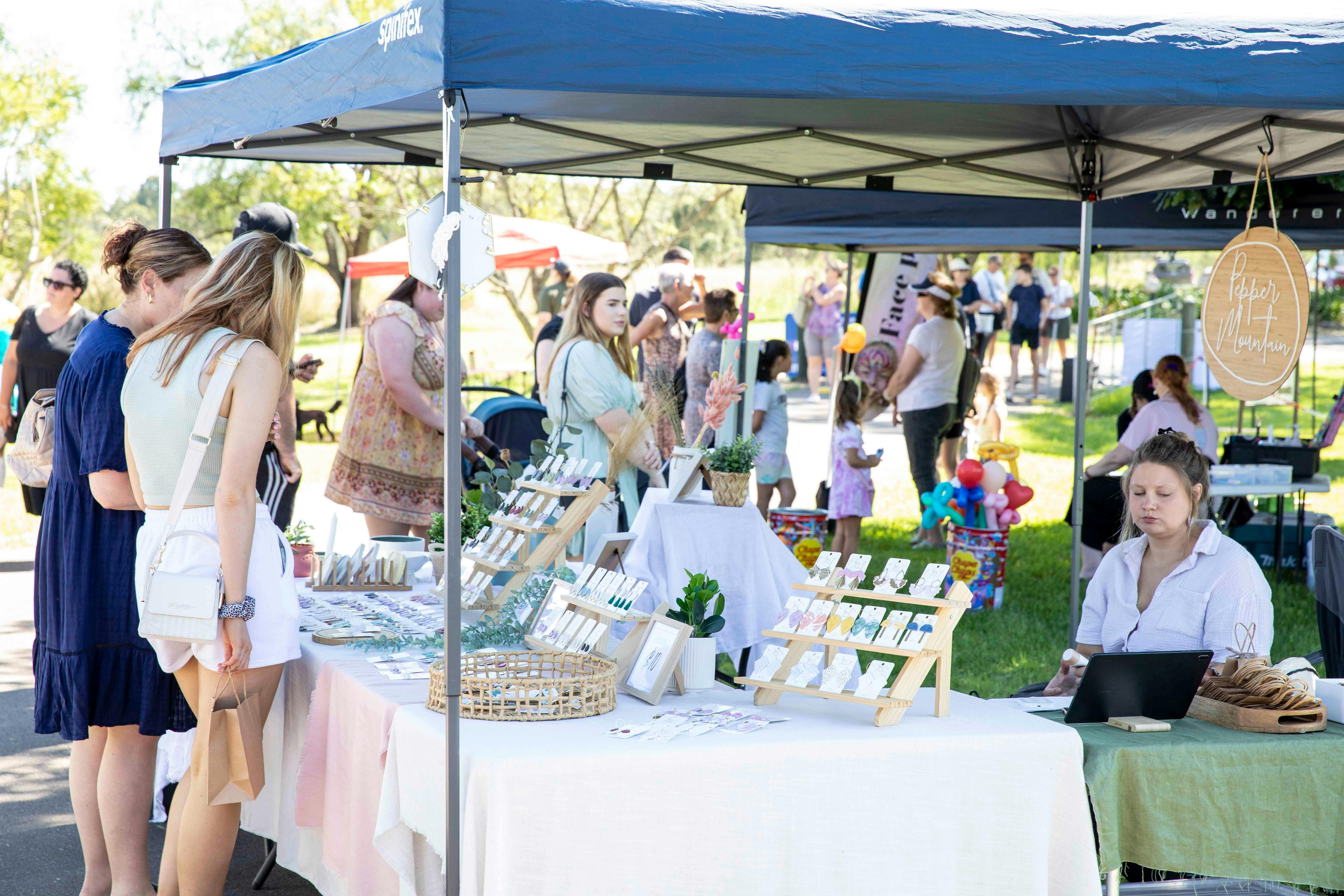 People browsing the local market stalls