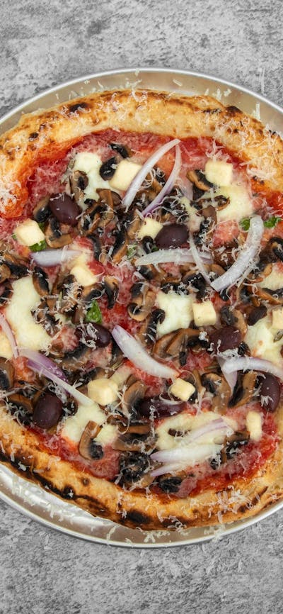 San Marzano Tomatoes, Fior de latte, Mushrooms, Olives, Spanish onion finish with Spicy Hot Peppers
