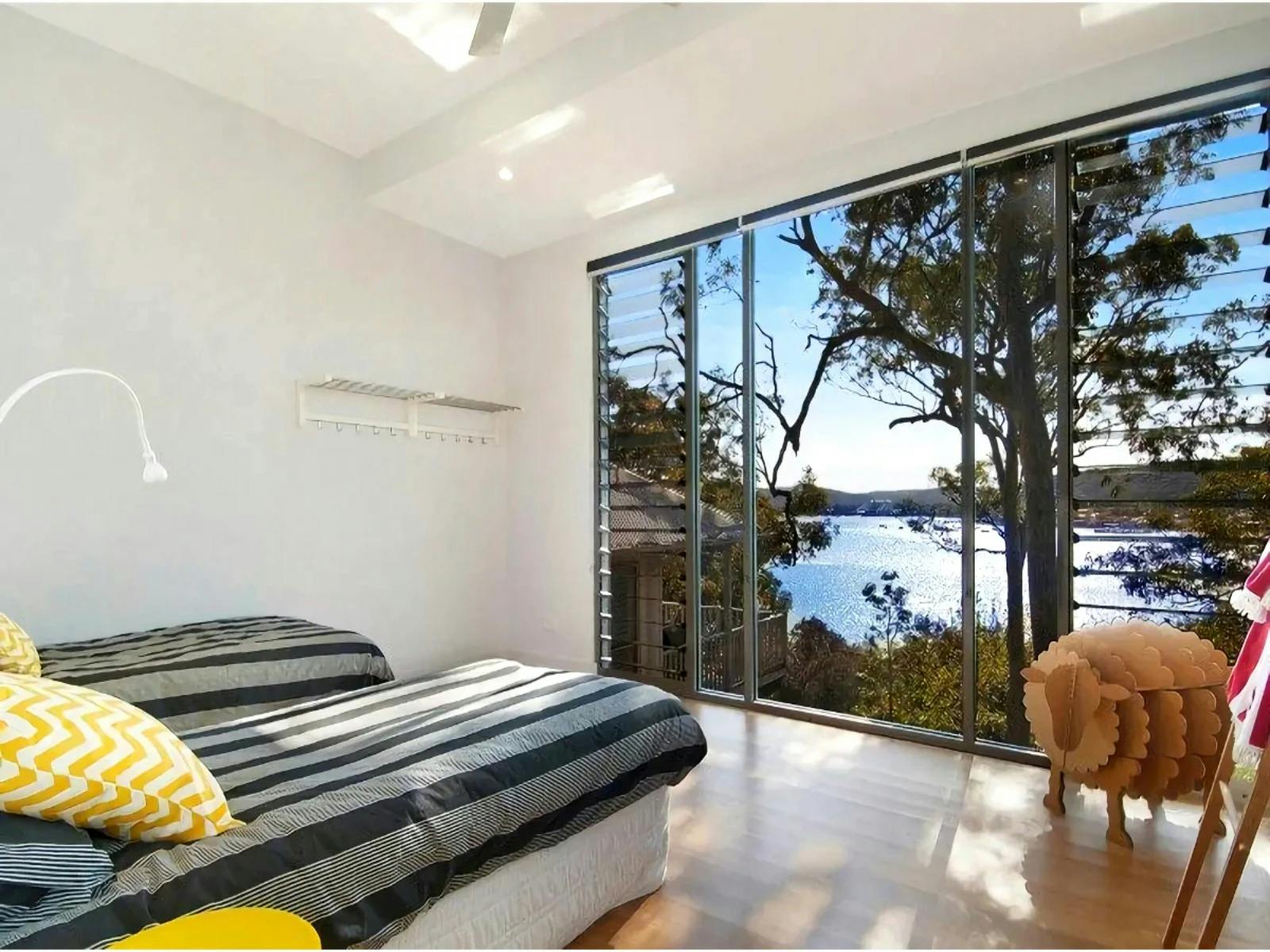 Double bed with 180 degree water views