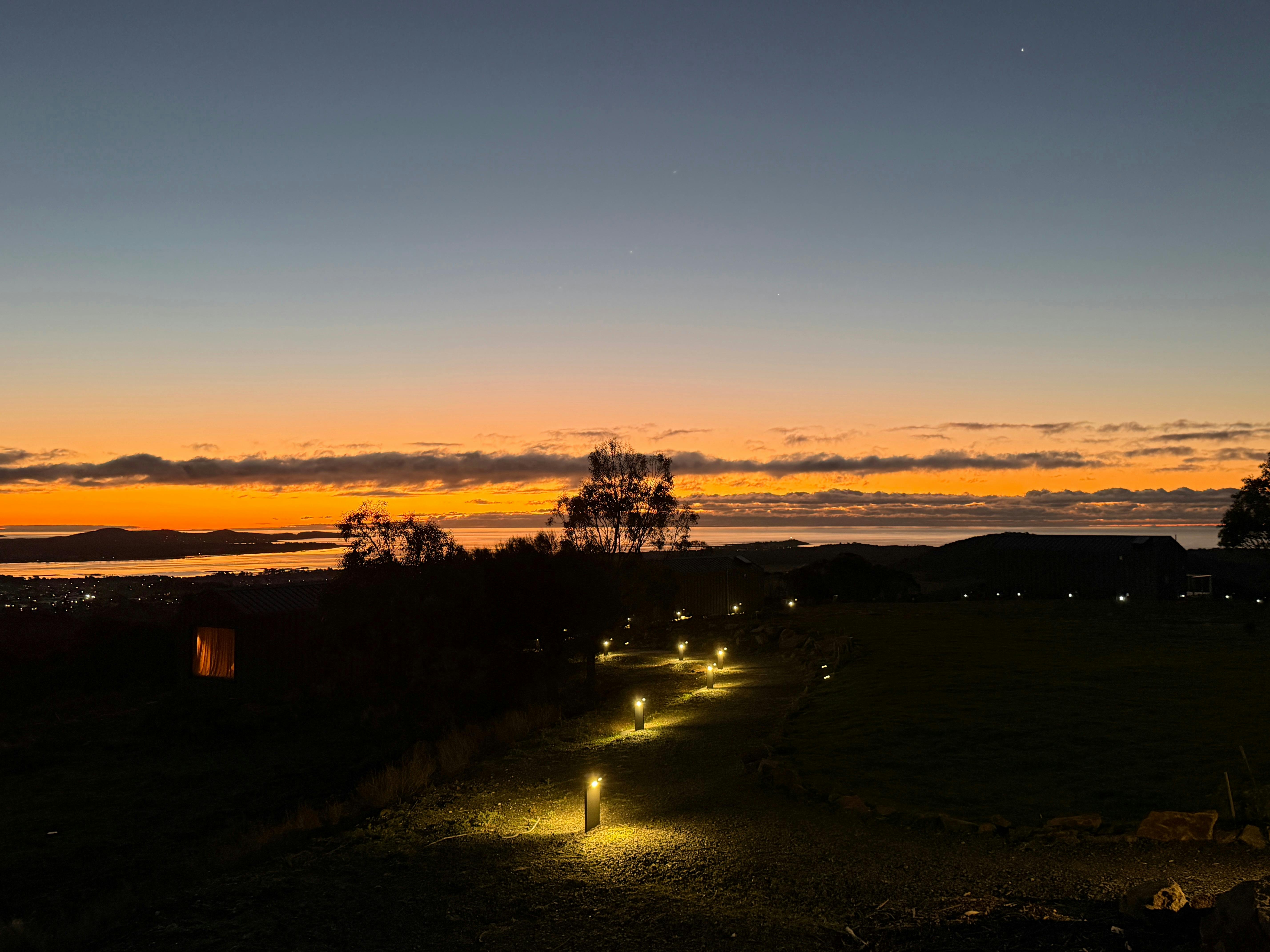 The George Tasmania lit up at night