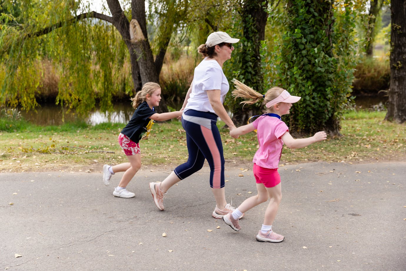 Mother and two kids participating in the fun run