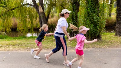 Mother and two kids participating in the fun run