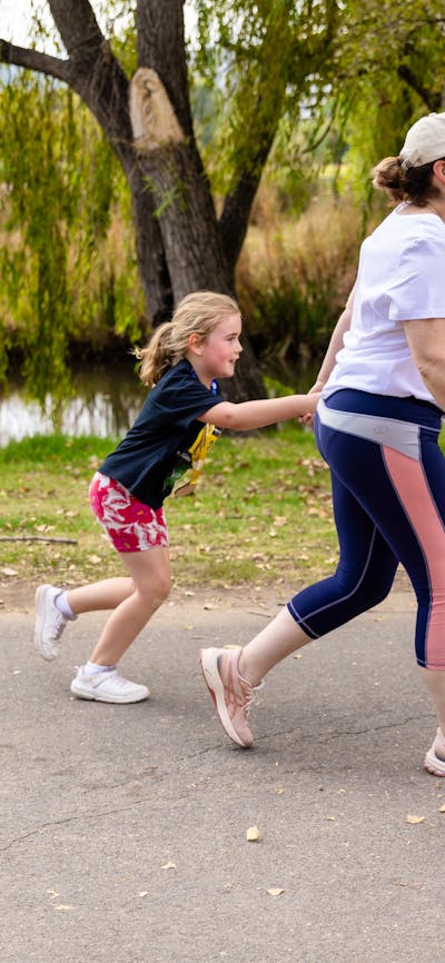 Mother and two kids participating in the fun run