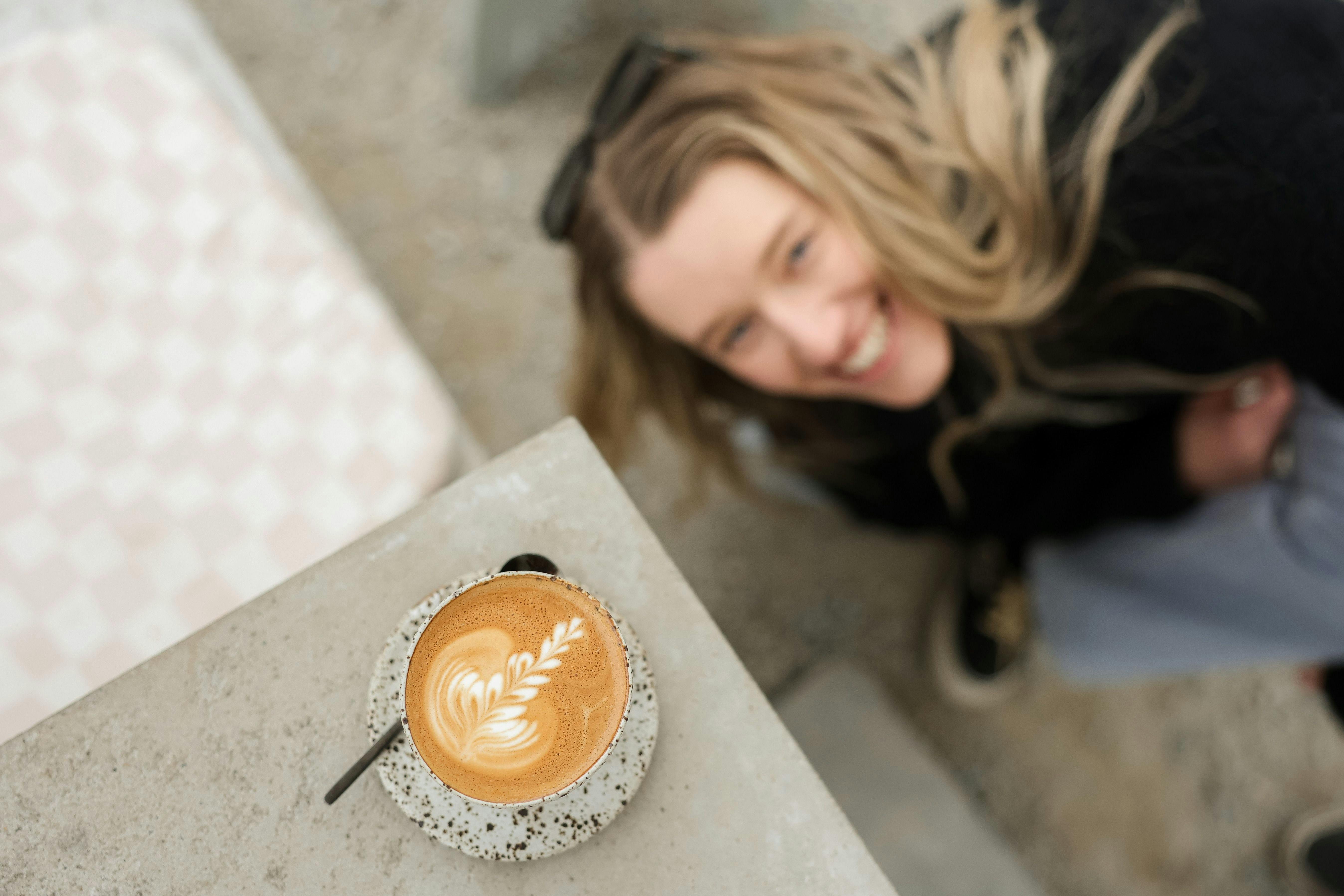 Customer Chelsea stoked with her coffee