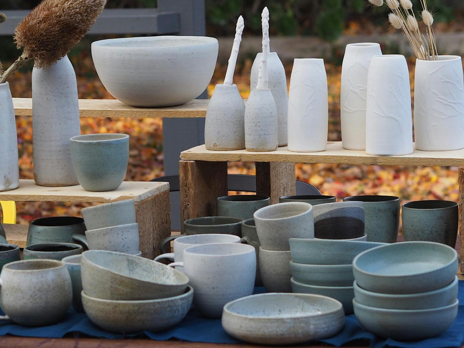a selection of ceramic vases, bowls and mugs