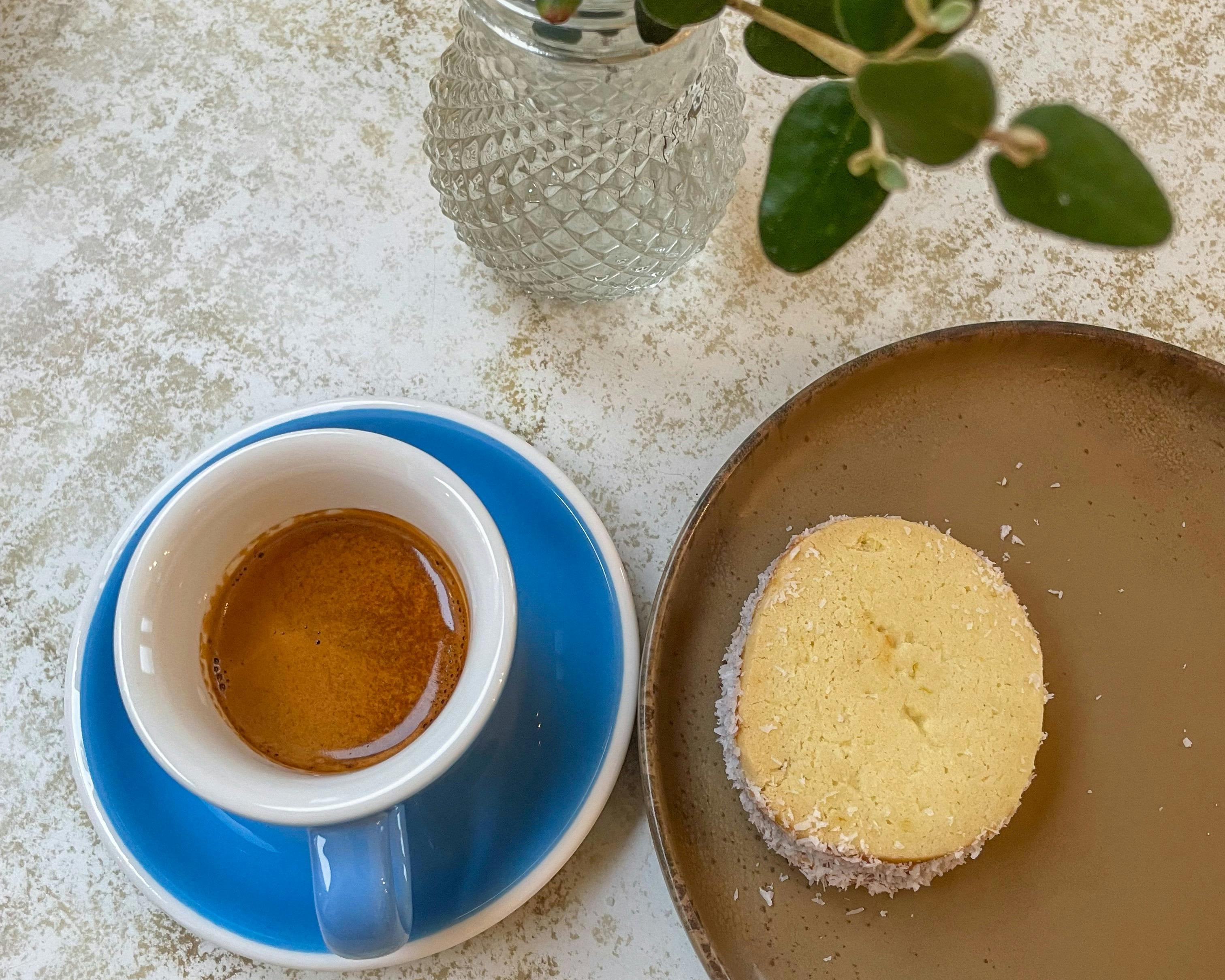 Close up of coffee and alfajor