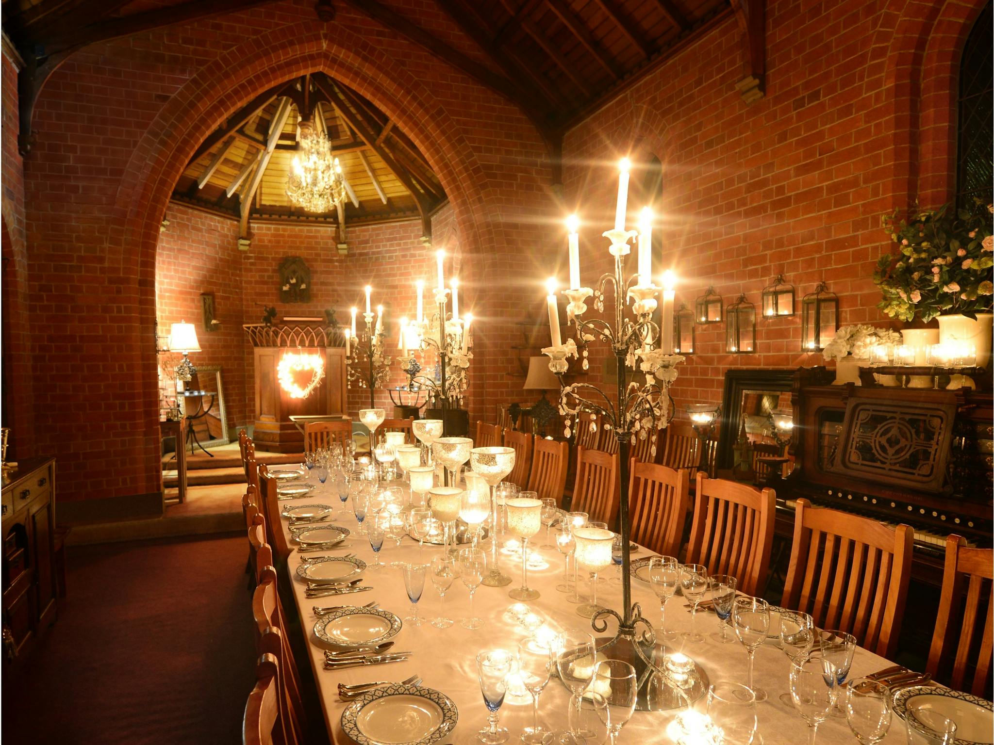 Stunning small private Chapel with lofty ceilings, chandeliers, magnificent table settings & candles