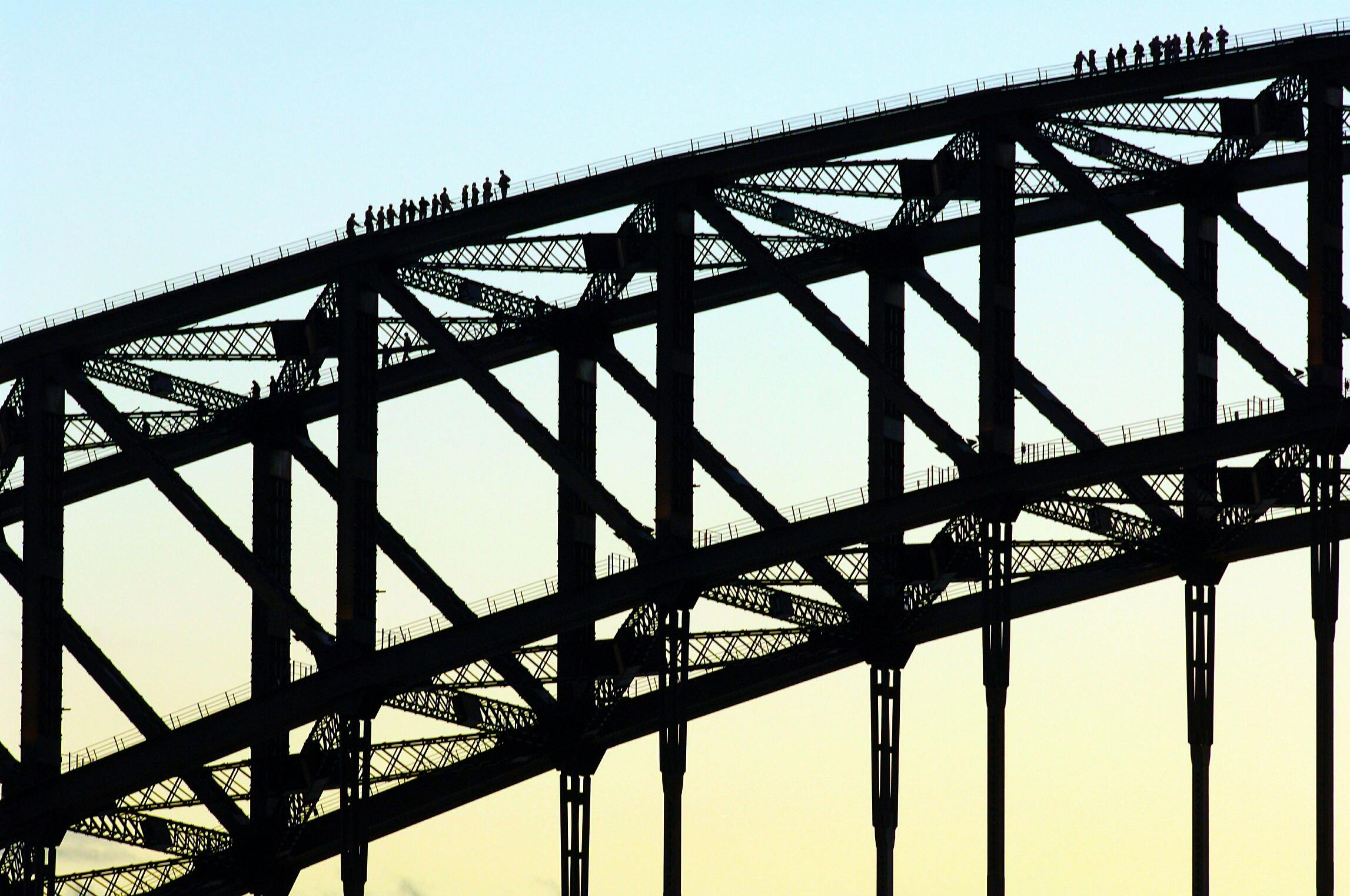 Climb along the upper arch of the Sydney Harbour Bridge on a Summit Climb