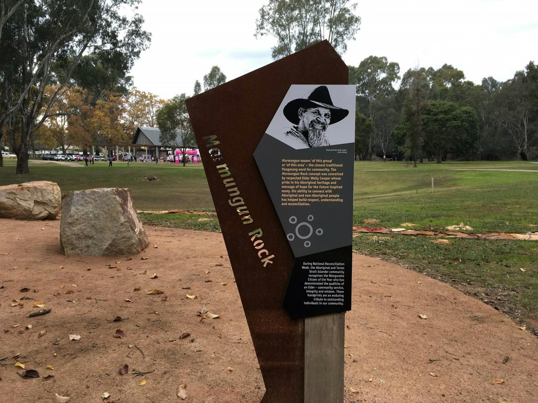 Marmungan Rock, Interpretative Sign with sketch of Aboriginal Man, Apex Park, trees, cars, shelter