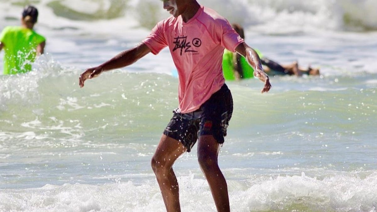 Student surfing for the first time