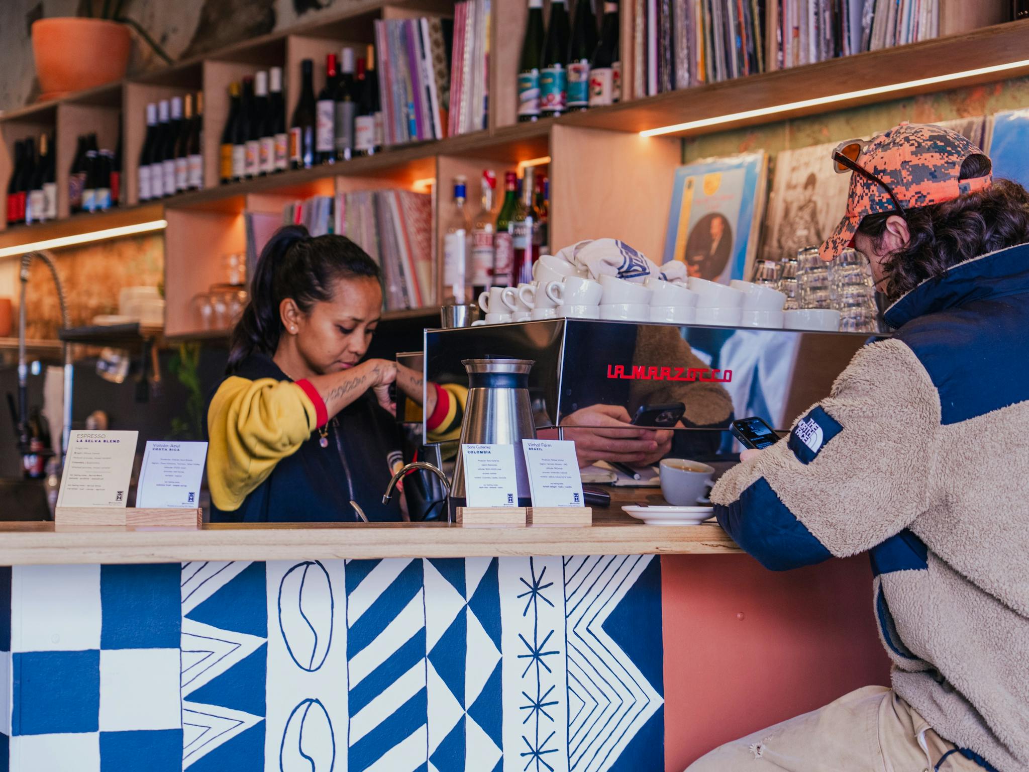 Barista serving coffee