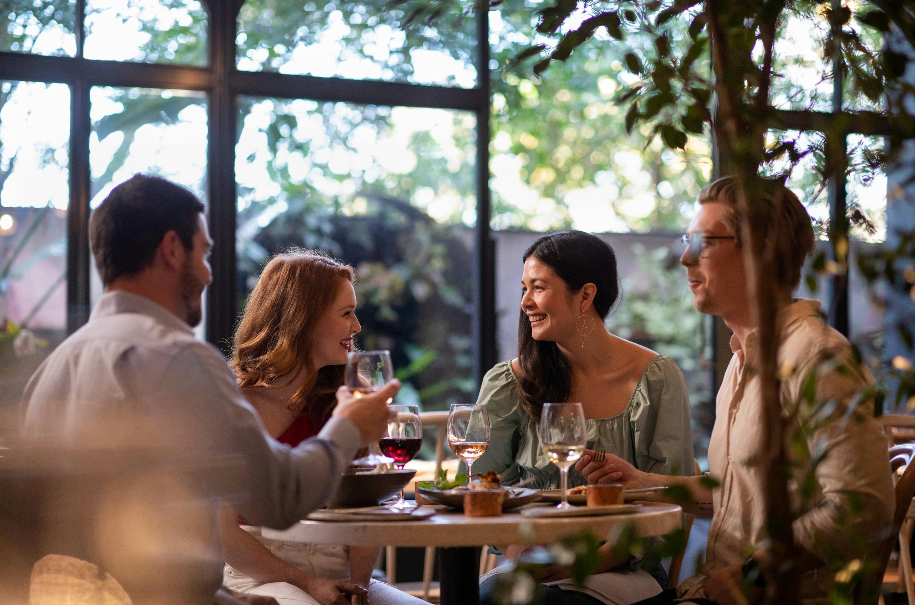 Friends enjoying Middle Eastern cuisine at Nour Restaurant, Surry Hills
