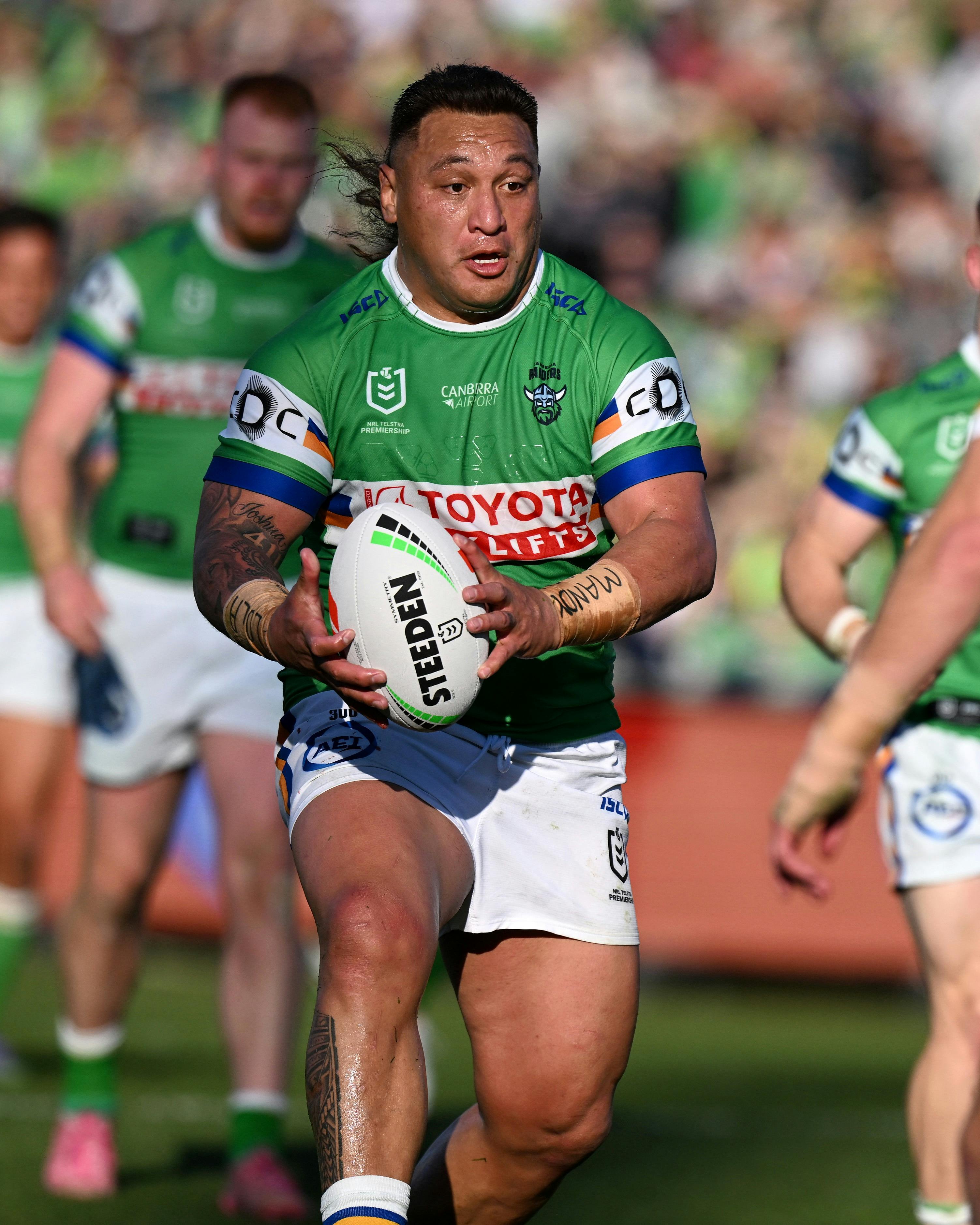 Canberra Raiders player Josh Papali'i runs the ball.