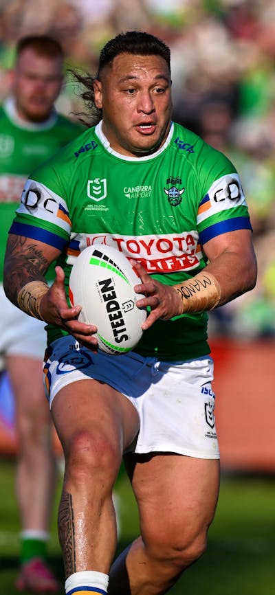 Canberra Raiders player Josh Papali'i runs the ball.