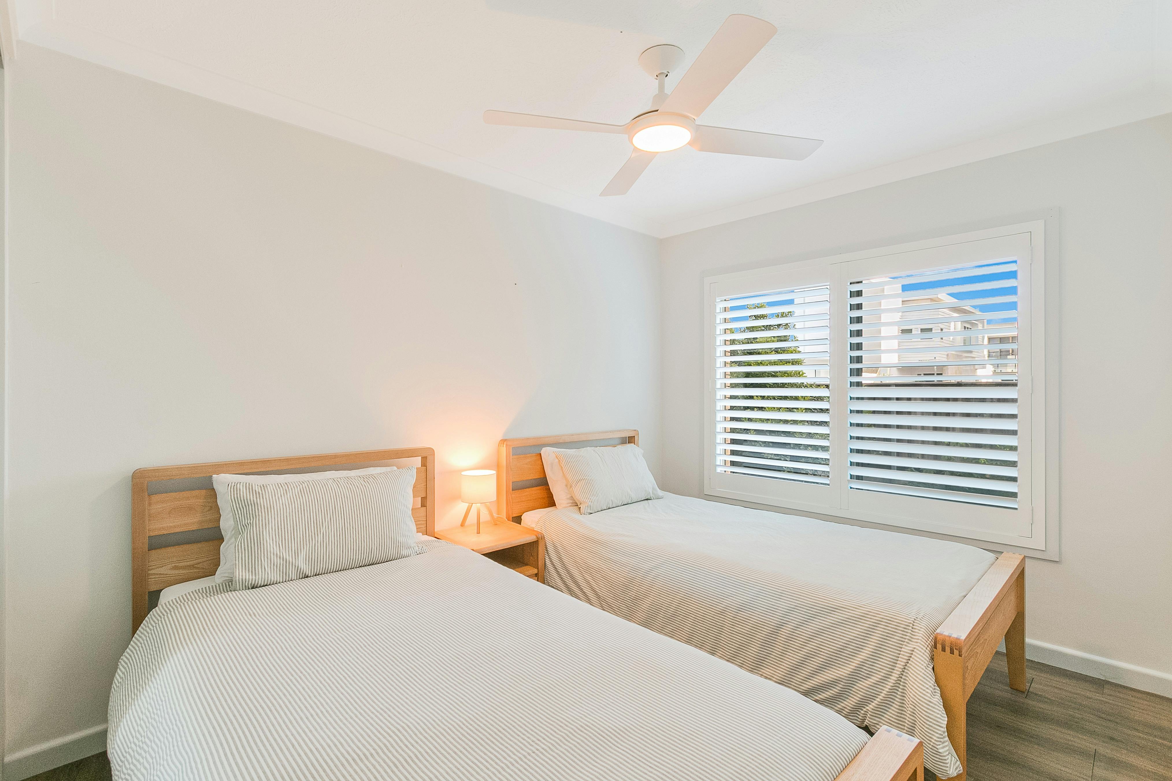 Second bedroom with 2 king single beds