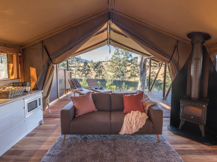 Interior of safari tent with fireplace