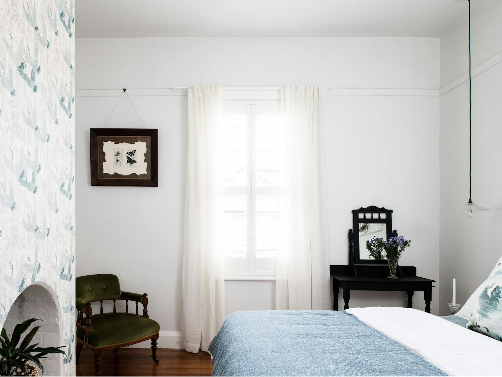 Enjoy a restful sleep in pure linen sheets and luxury bedding in this vintage inspired bedroom