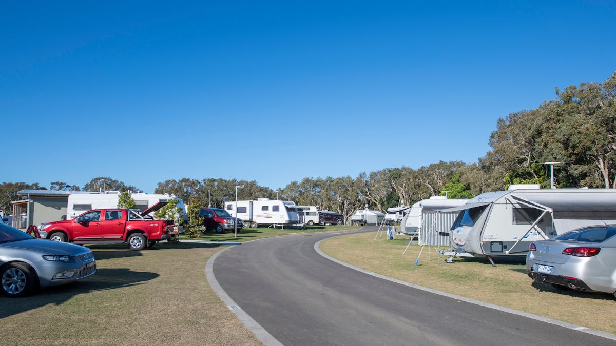 Shot of caravans and cars on new sites at Mudjimba Beach Holiday Park