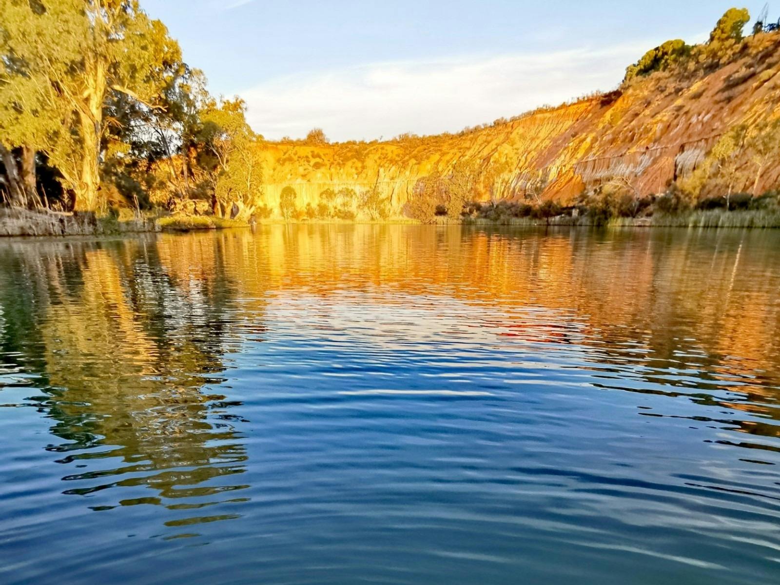 Sunset light reflecting on the Murray River Cliffs