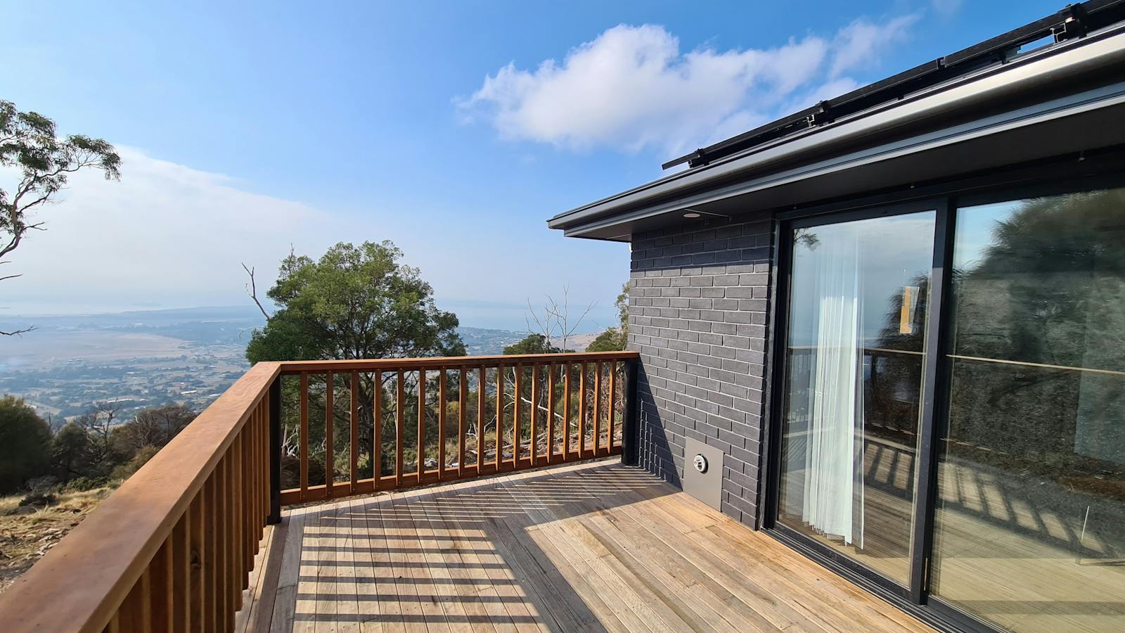 Private deck surrounded by Tasmanian bushland