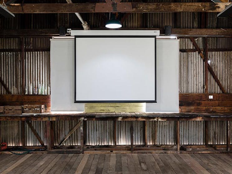 The projection screen at Corney's Garage in Hartley HIstoric Site. Photo: Jennifer Leahy &copy; DPIE