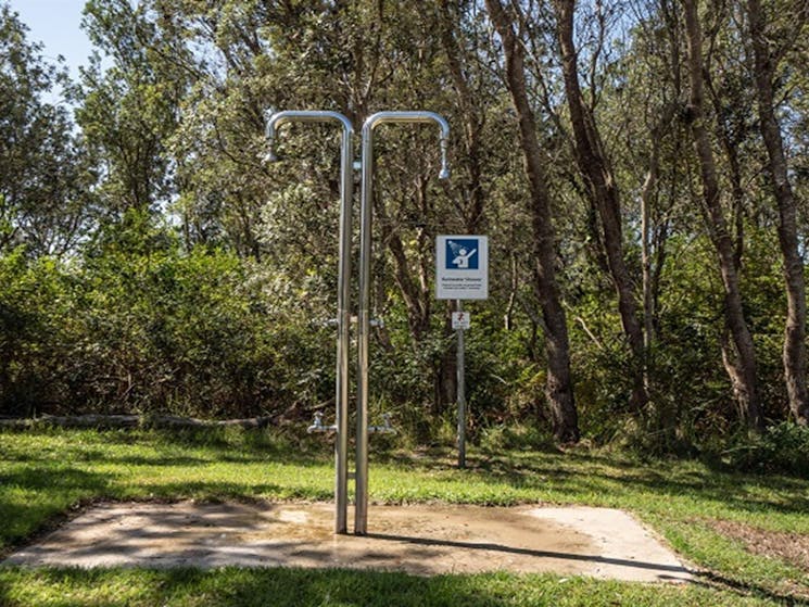Outdoor rainwater shower at Crowdy Gap campground, Crowdy Bay National Park. Photo: Rob Mulally/DPIE