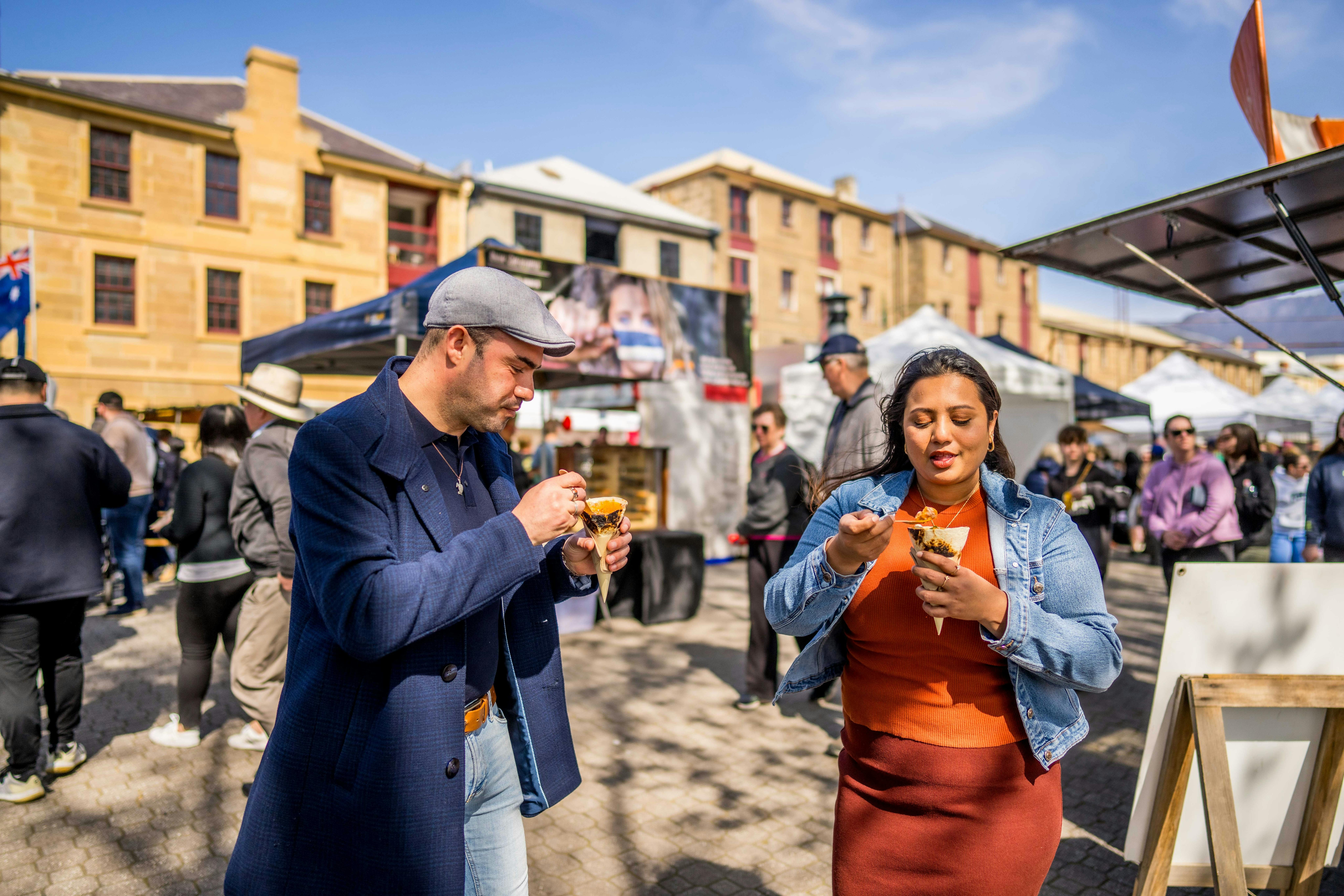 A couple try one of the pocket curries for lunch