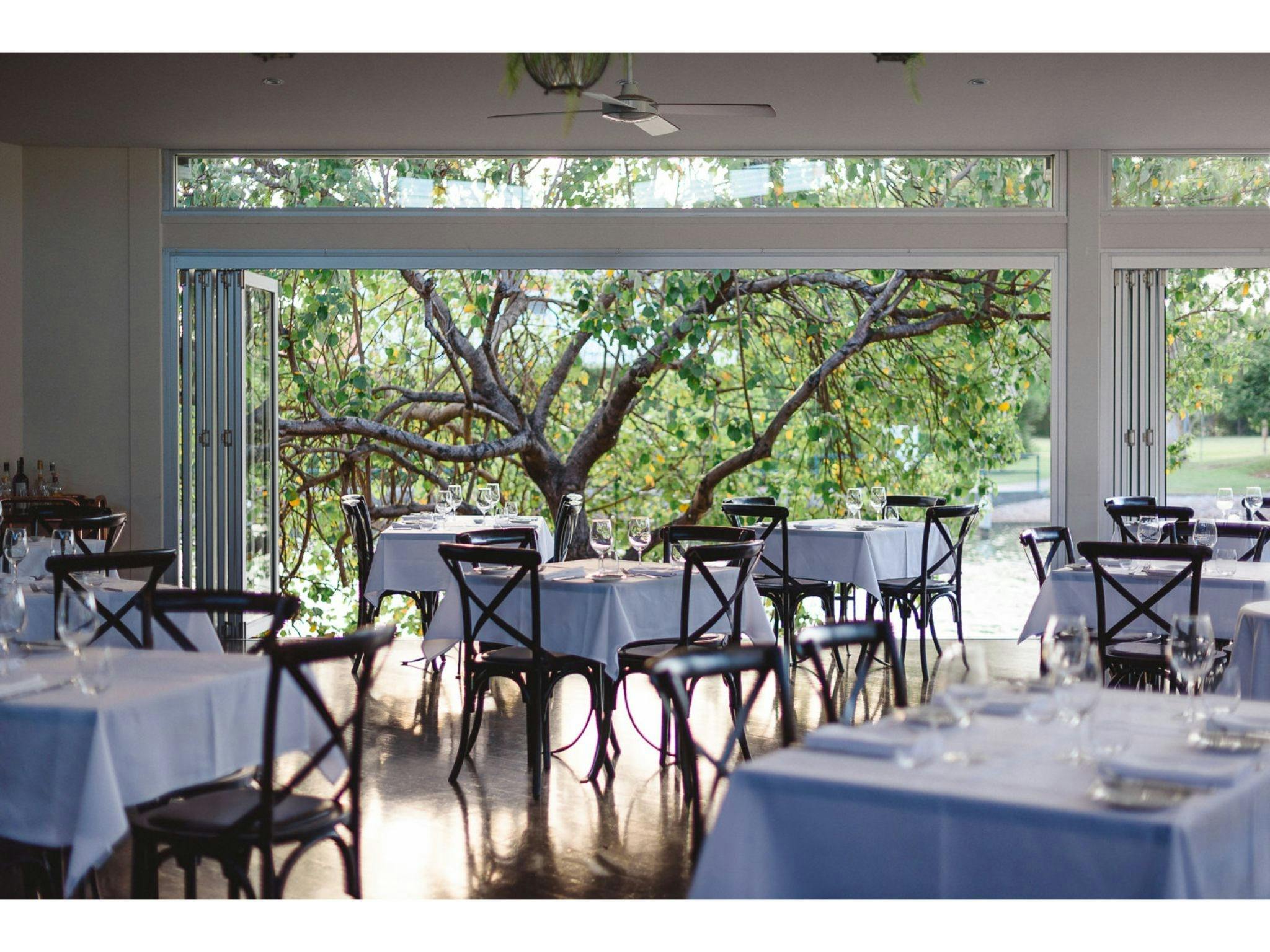 casual, yet elegant dining experience, overlooking a calm canal inlet