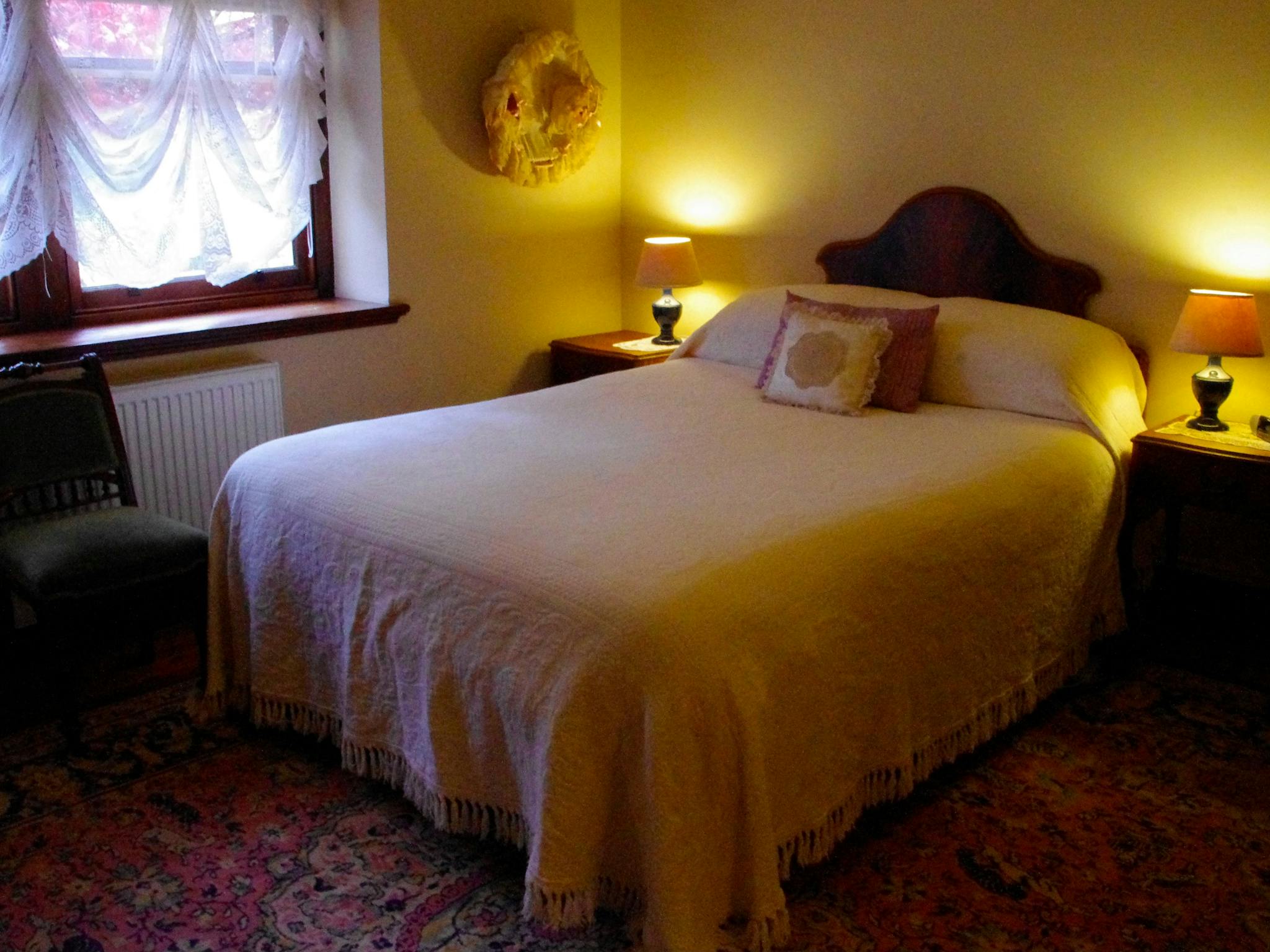 The Homestead Suite, one bedroom, private entry, dining, cosy open fireplace